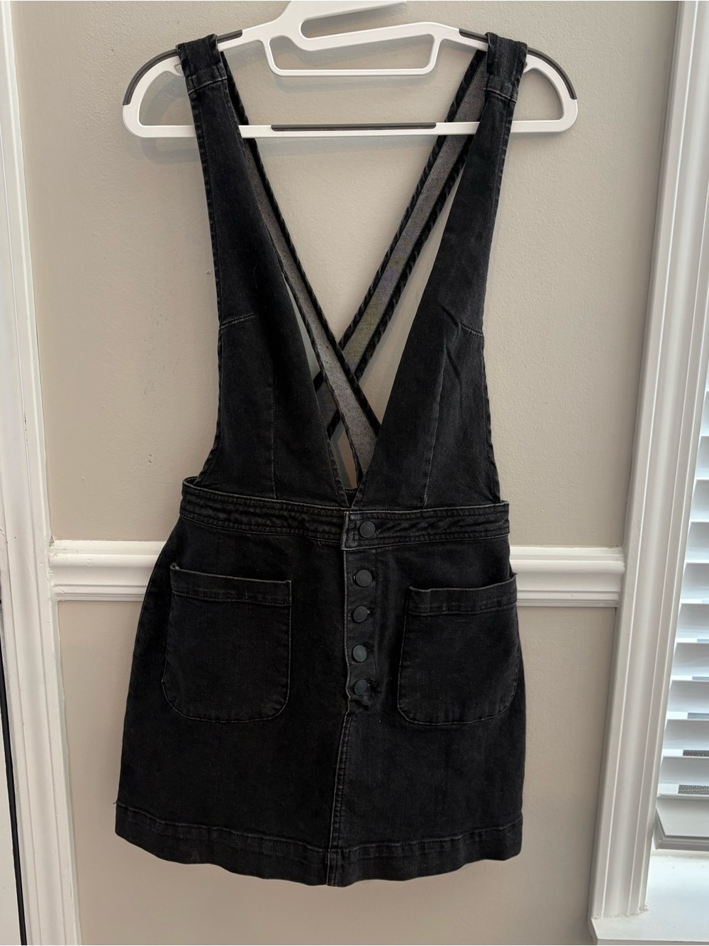 Free People Black Denim Overall Dress with a cross-back design Size 5 EUC